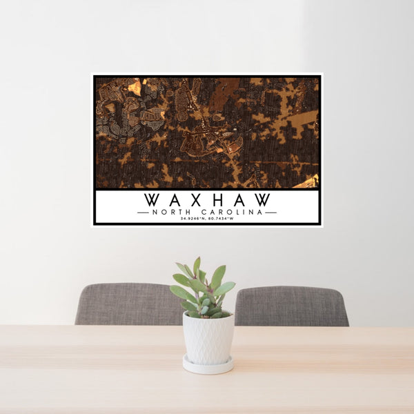24x36 Waxhaw North Carolina Map Print Lanscape Orientation in Ember Style Behind 2 Chairs Table and Potted Plant