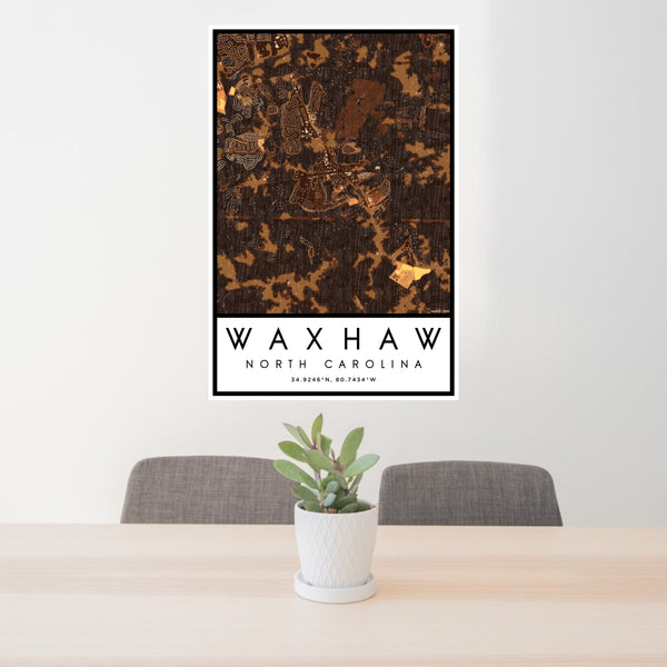 24x36 Waxhaw North Carolina Map Print Portrait Orientation in Ember Style Behind 2 Chairs Table and Potted Plant