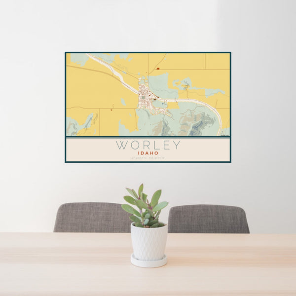 24x36 Worley Idaho Map Print Lanscape Orientation in Woodblock Style Behind 2 Chairs Table and Potted Plant